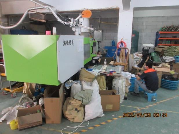 Injection molding equipment photographed in May 2025